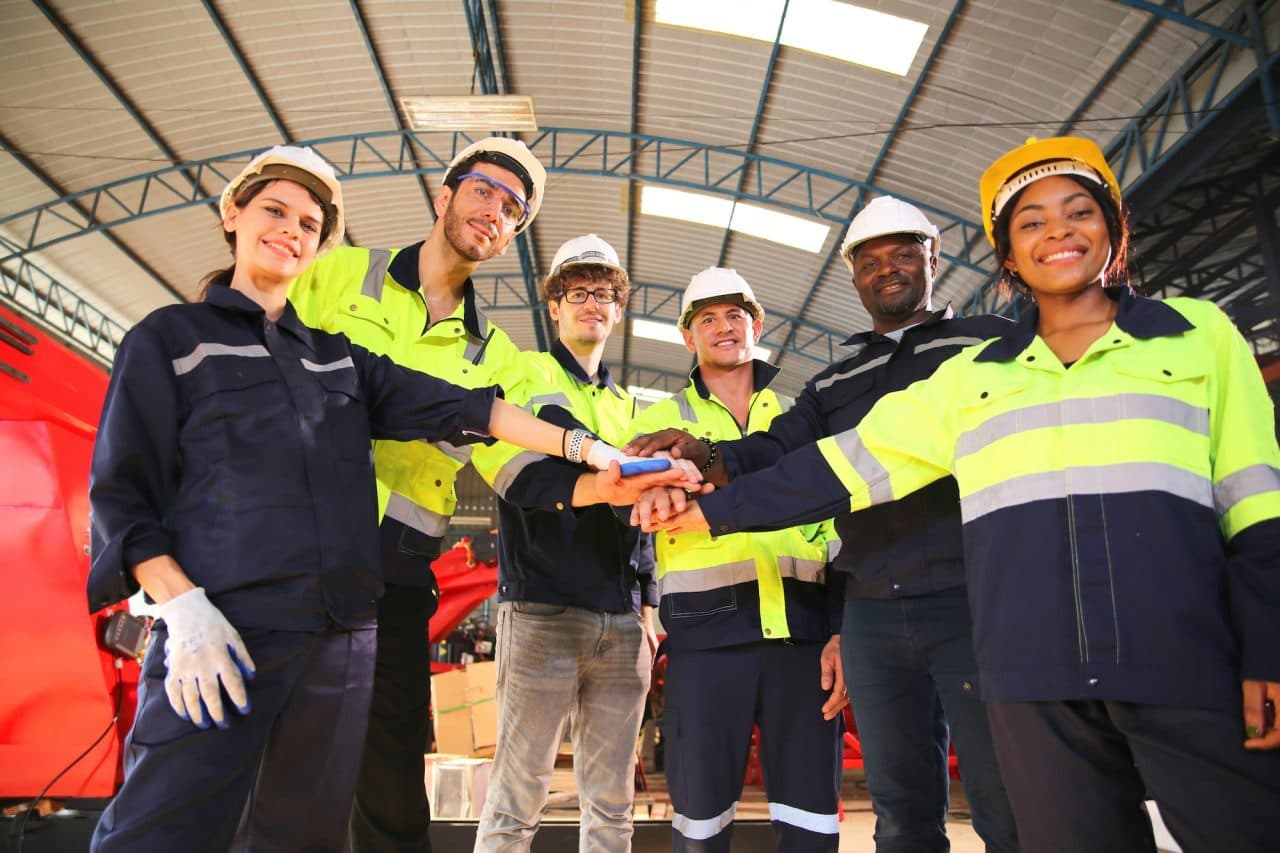 Team members in safety gear